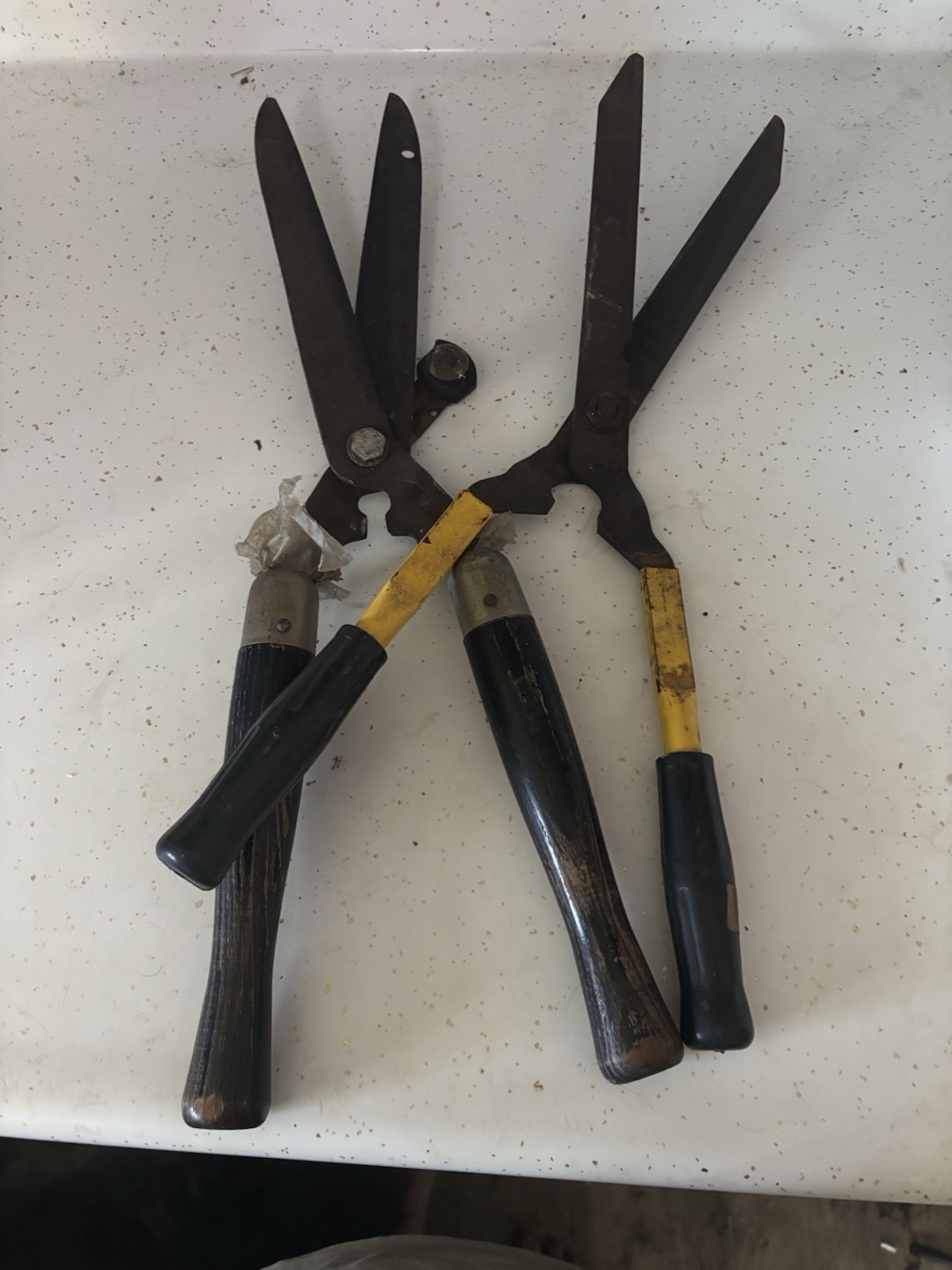 Two pair Vintage glass clippers one with and one on branded